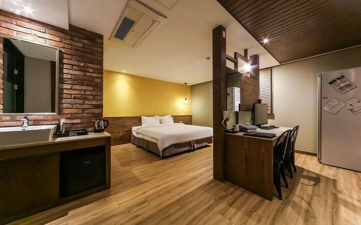 Imagen de la habitación del Hotel Gimhae Jangyu AM. Foto 14