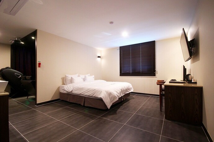 Imagen de la habitación del Hotel Gimhae Jangyu AM. Foto 22