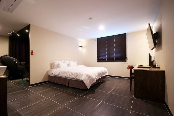 Imagen de la habitación del Hotel Gimhae Jangyu AM. Foto 23