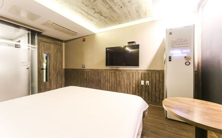 Imagen de la habitación del Hotel Gimhae Jangyu AM. Foto 30
