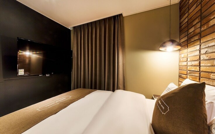 Imagen de la habitación del Hotel Gimpo Docking Hotel. Foto 22