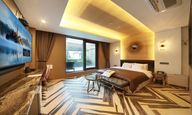 Imagen de la habitación del Hotel Gimpo M Tower. Foto 5