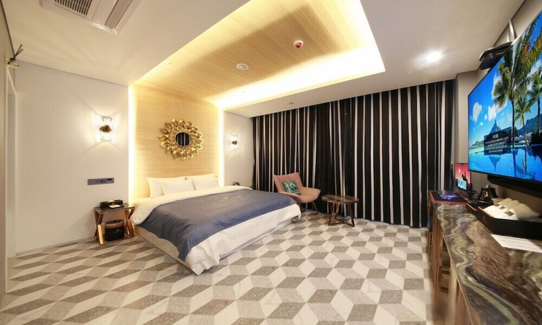 Imagen de la habitación del Hotel Gimpo M Tower. Foto 7