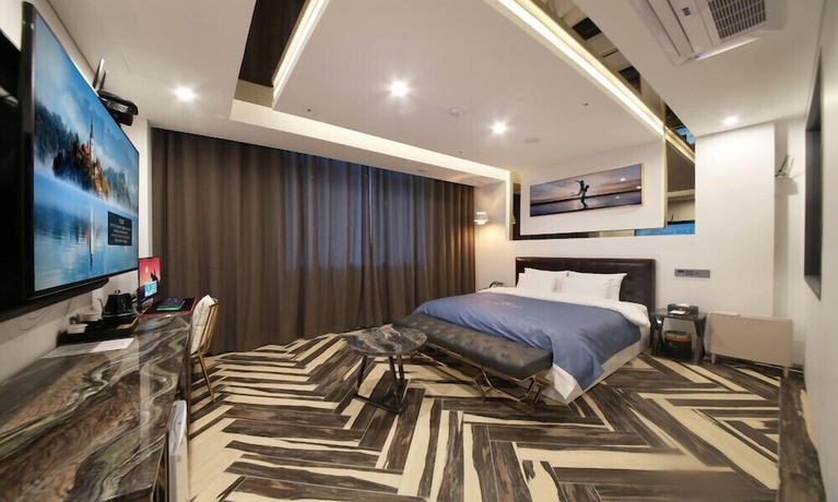 Imagen de la habitación del Hotel Gimpo M Tower. Foto 9