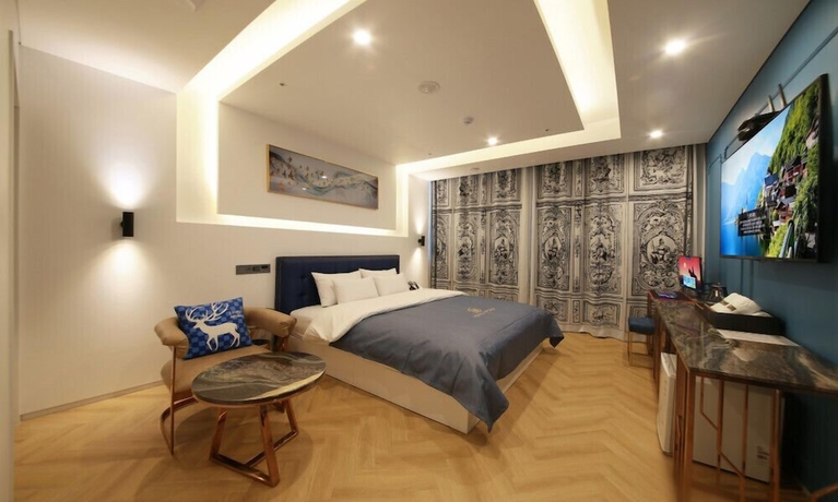 Imagen de la habitación del Hotel Gimpo M Tower. Foto 15