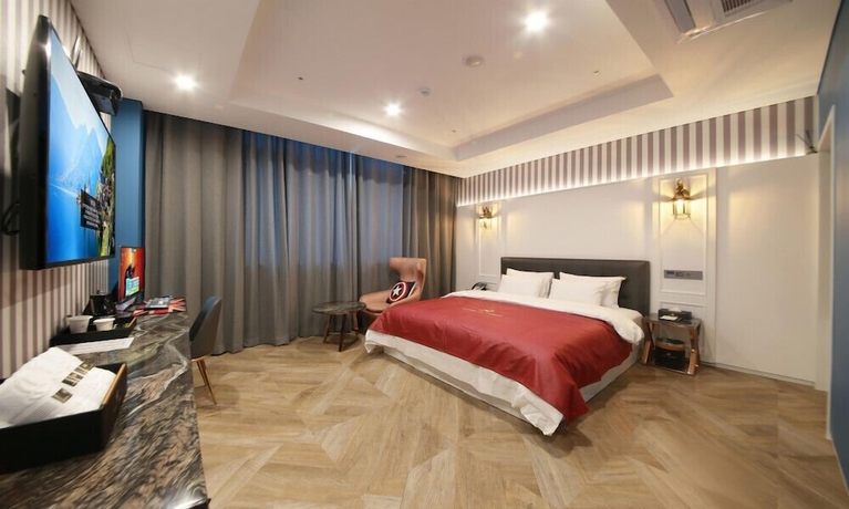Imagen de la habitación del Hotel Gimpo M Tower. Foto 16