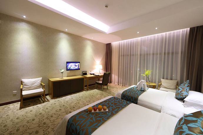 Imagen de la habitación del Hotel Gin Mao Yuan Shenzhen. Foto 4