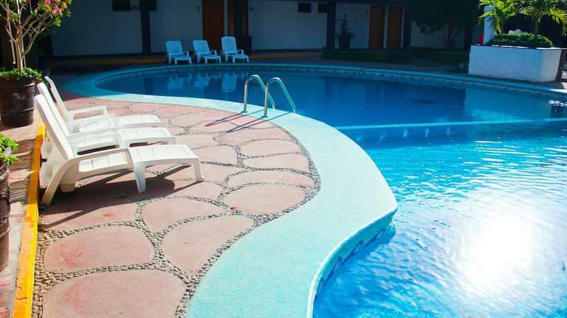 Imagen de la piscina del Hotel Gina, Tecom&aacute;n. Foto 11