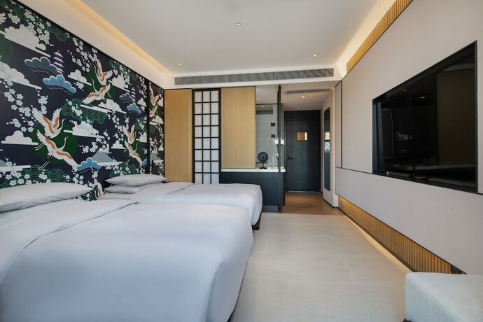 Imagen de la habitación del Hotel Ginco Guangzhou Baiyun Airport. Foto 16