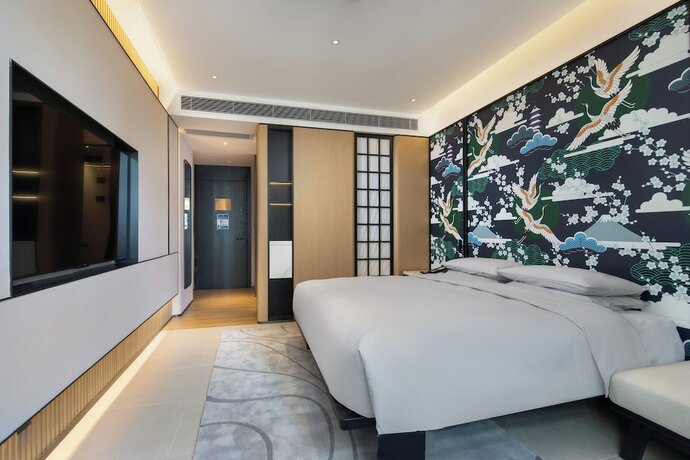 Imagen de la habitación del Hotel Ginco Guangzhou Baiyun Airport. Foto 18