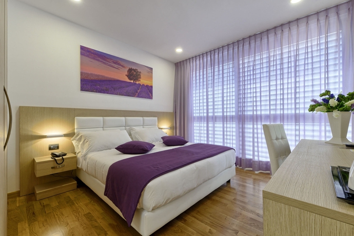 Imagen de la habitación del Hotel Ginevra Palace. Foto 4