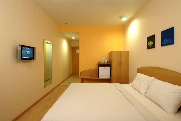Imagen de la habitación del Hotel Ginger Agartala. Foto 21
