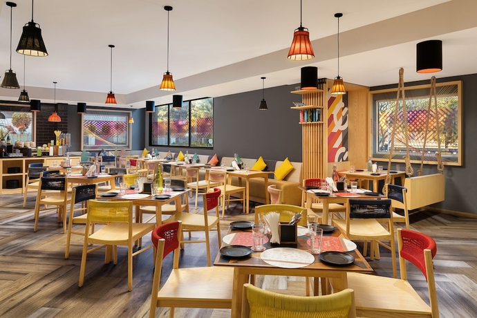 Imagen del bar/restaurante del Hotel Ginger Ahmedabad Changodar. Foto 2