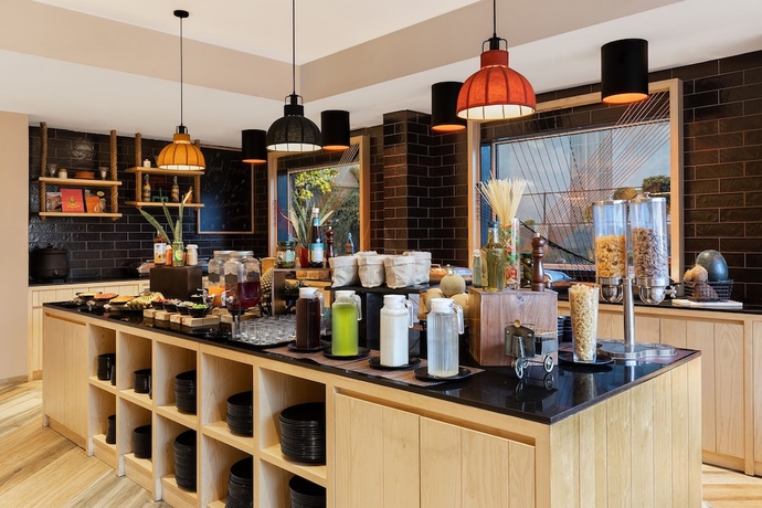 Imagen del bar/restaurante del Hotel Ginger Ahmedabad Changodar. Foto 3