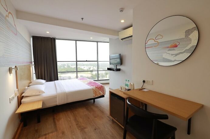 Imagen de la habitación del Hotel Ginger Ahmedabad Rto Circle. Foto 14
