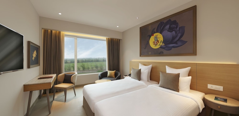 Imagen de la habitación del Hotel Ginger Dwarka. Foto 2