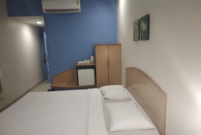 Imagen de la habitación del Hotel Ginger Dwarka. Foto 4