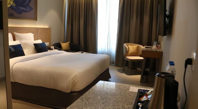 Imagen de la habitación del Hotel Ginger Dwarka. Foto 5