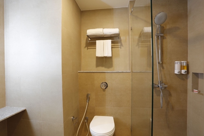 Imagen de la habitación del Hotel Ginger Dwarka. Foto 10