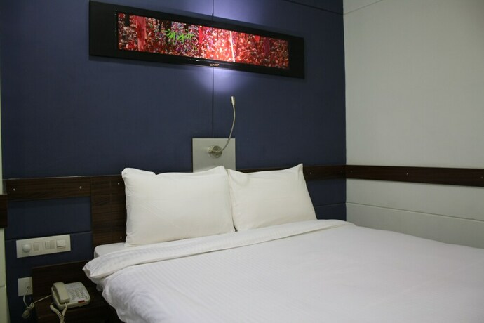 Imagen de la habitación del Hotel Ginger Faridabad. Foto 16