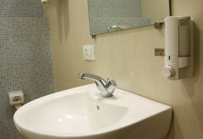 Imagen de la habitación del Hotel Ginger Faridabad. Foto 17