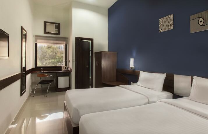 Imagen de la habitación del Hotel Ginger Faridabad. Foto 18