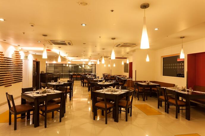 Imagen del bar/restaurante del Hotel Ginger Indore. Foto 16