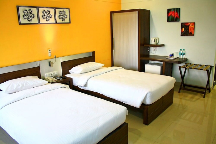 Imagen de la habitación del Hotel Ginger Manesar. Foto 5