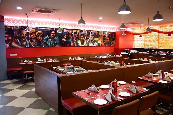 Imagen del bar/restaurante del Hotel Ginger Manesar. Foto 2