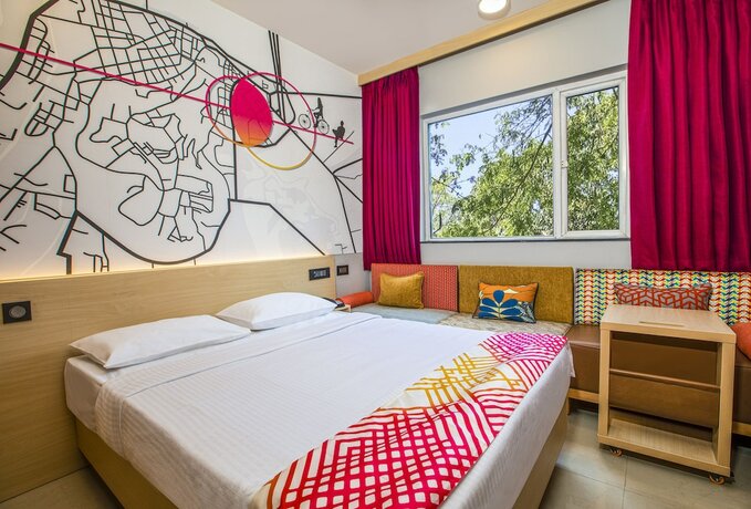 Imagen de la habitación del Hotel Ginger Nashik. Foto 16