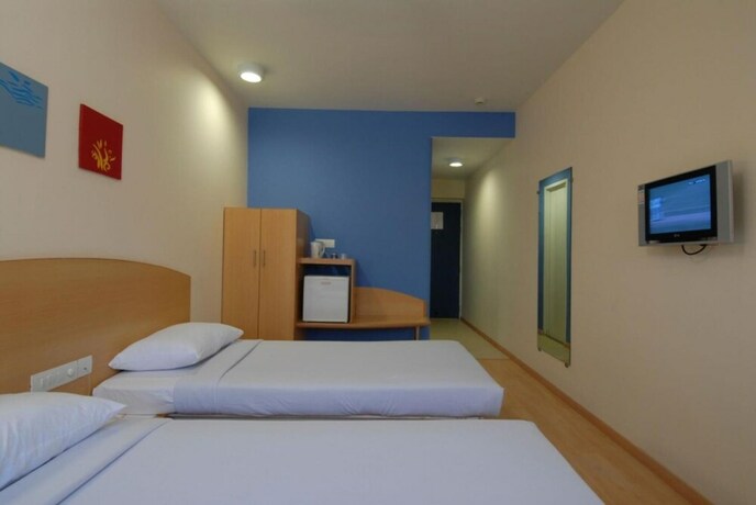 Imagen de la habitación del Hotel Ginger Vadodara. Foto 21