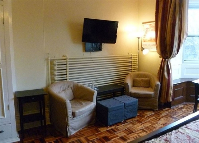 Imagen de la habitación del Hotel Gingerbread Manor. Foto 4