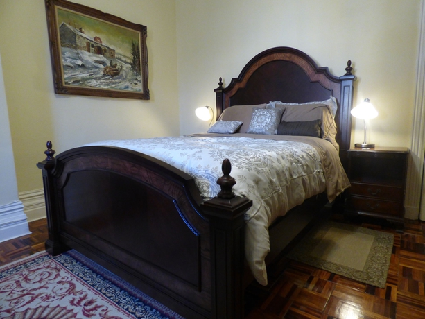 Imagen de la habitación del Hotel Gingerbread Manor. Foto 7