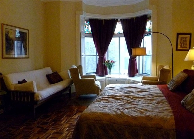 Imagen de la habitación del Hotel Gingerbread Manor. Foto 9