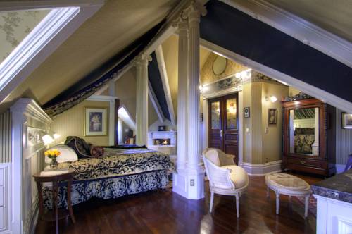 Imagen de la habitación del Hotel Gingerbread Mansion Inn. Foto 4