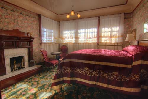 Imagen de la habitación del Hotel Gingerbread Mansion Inn. Foto 9
