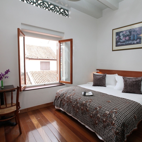 Imagen de la habitación del Hotel Gingerflower Boutique. Foto 3