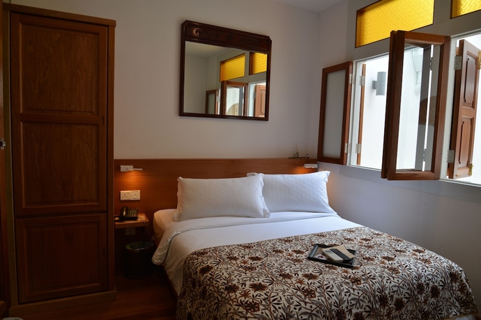Imagen de la habitación del Hotel Gingerflower Boutique. Foto 6