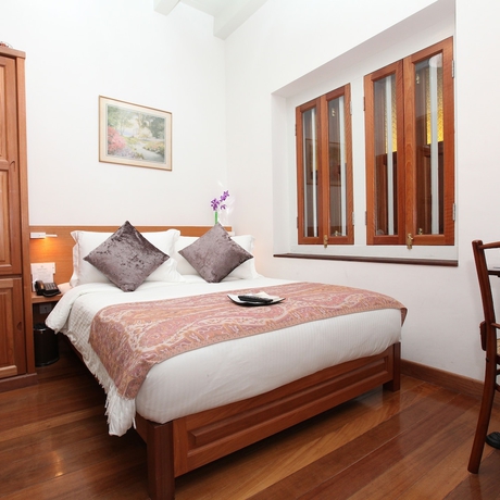 Imagen de la habitación del Hotel Gingerflower Boutique. Foto 7