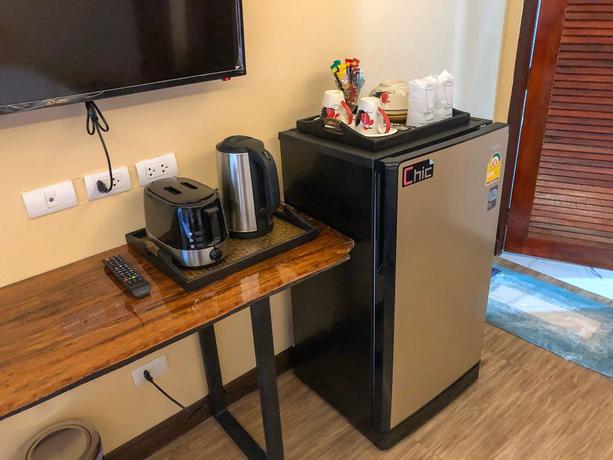 Imagen de la habitación del Hotel Ginis Beach Resort. Foto 18