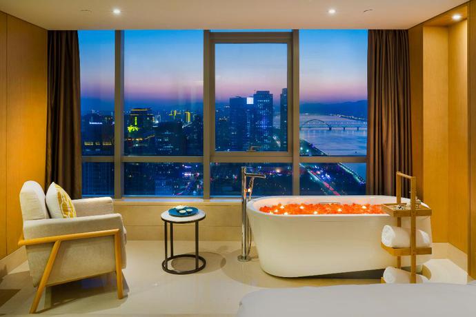 Imagen de la habitación del Hotel GinlanJIA Yuntai Impression Hotel. Foto 10