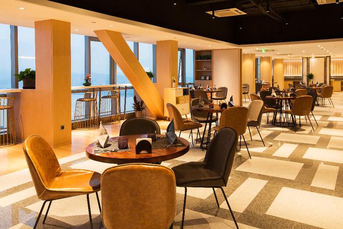 Imagen del bar/restaurante del Hotel GinlanJIA Yuntai Impression Hotel. Foto 4