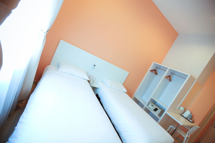 Imagen de la habitación del Hotel G-inn. Foto 4