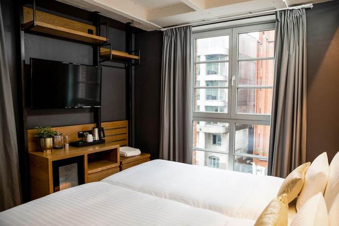 Imagen de la habitación del Hotel Ginn Hamburg Elbspeicher. Foto 7