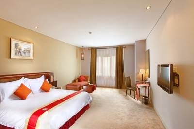 Imagen de la habitación del Hotel Gino Feruci Kebonjati. Foto 2