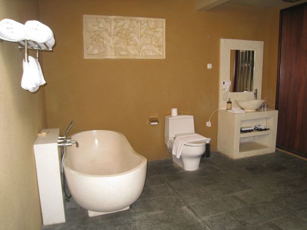 Imagen de la habitación del Hotel Gino Feruci Villa Ubud. Foto 9