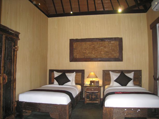 Imagen de la habitación del Hotel Gino Feruci Villa Ubud. Foto 10