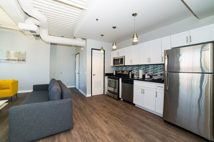 Imagen de la habitación del Hotel Ginosi Metropolitan Apartel. Foto 3