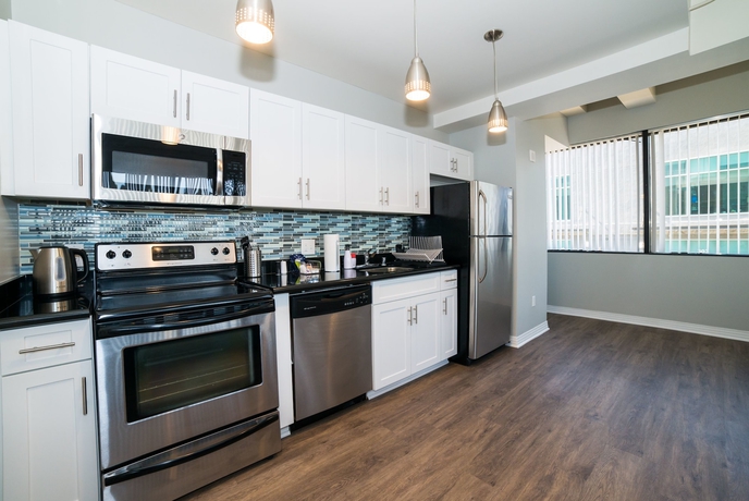 Imagen de la habitación del Hotel Ginosi Metropolitan Apartel. Foto 4