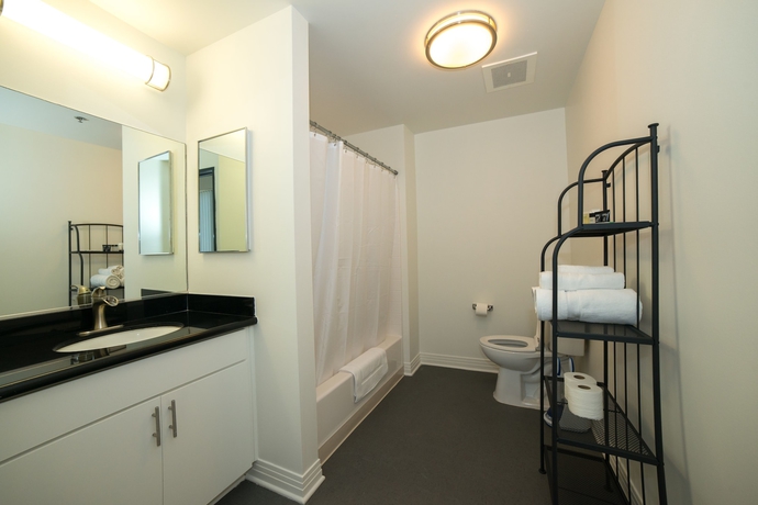 Imagen de la habitación del Hotel Ginosi Metropolitan Apartel. Foto 5